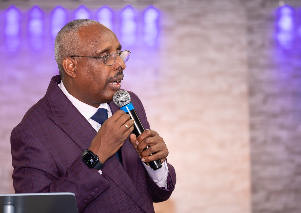 Rev. Peter Mutima preaching